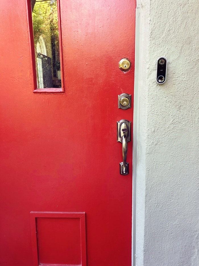 Old locks out, new set in: New handleset, deadbolt and video doorbell on the finished door.